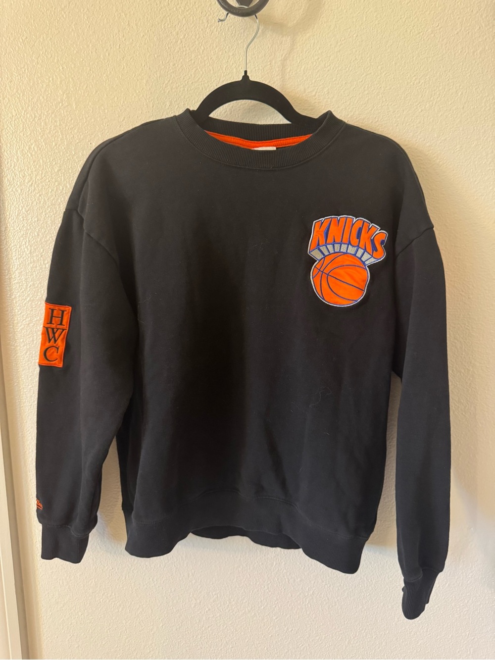 Mitchell & Ness Black Knicks Crewneck Sweatshirt with Orange Logo